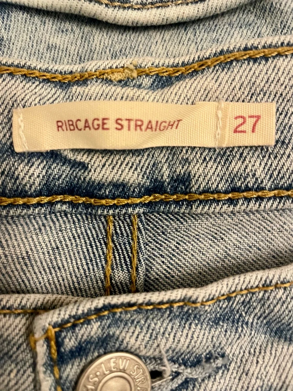 Levi's High-Rise Light Blue Distressed Straight Jeans
